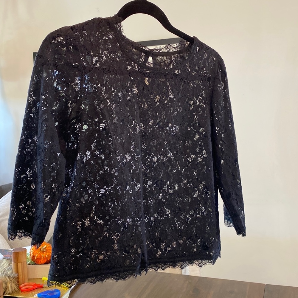 Lace top. Excellent condition. Perfect for the holidays.